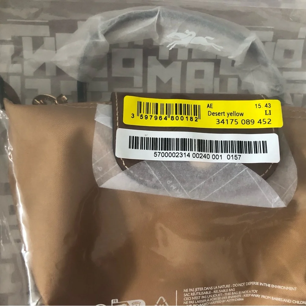 Longchamp brown tone pull